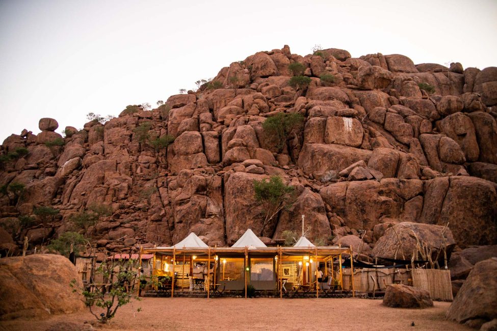 View of Twyfelfontein Adventure Camp in evening mood